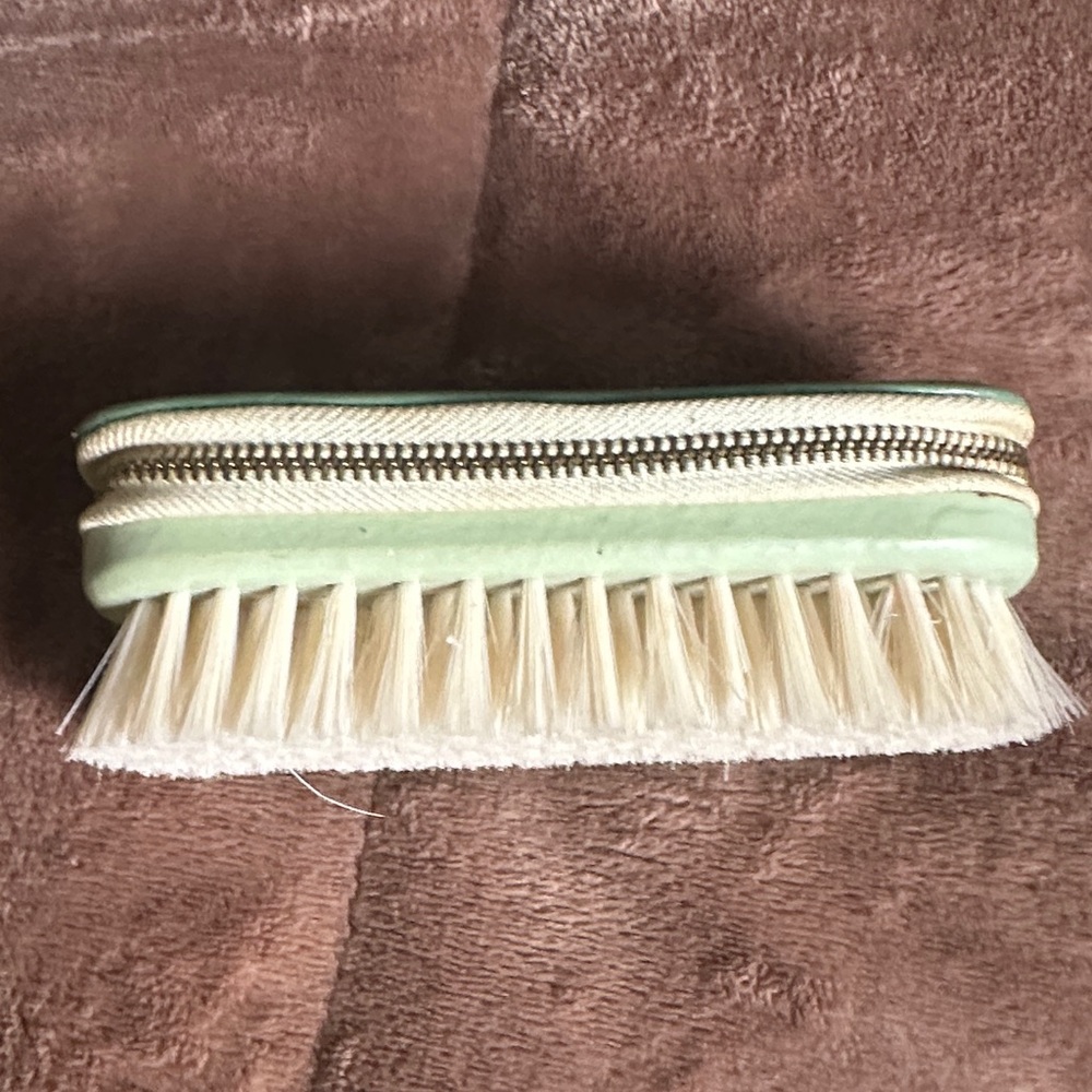 Green and Cream Cleaning Brush